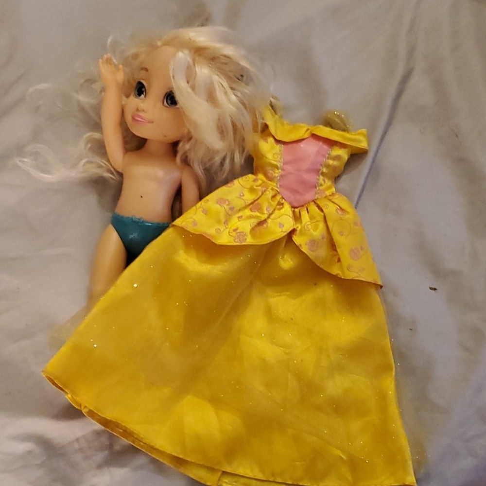 A doll with a dress